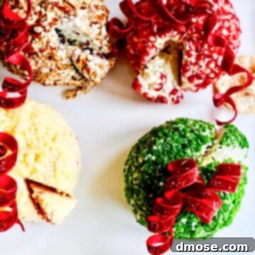 Harvest Everything Bagel Pumpkin Cheese Ball 9 4 cheese balls shaped round and topped with curly bows and ornament hooks to serve as Christmas appetizers.