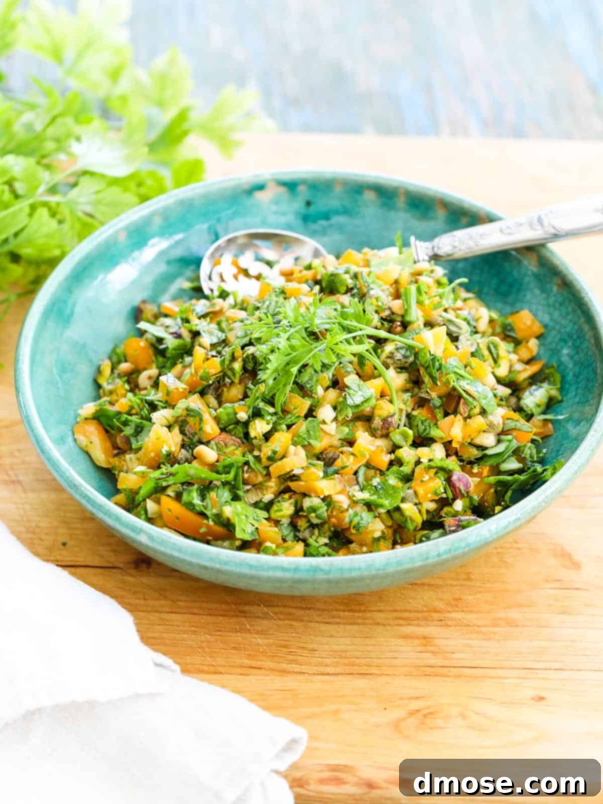 A charming bowl of vibrant gremolata, perfect for garnishing.