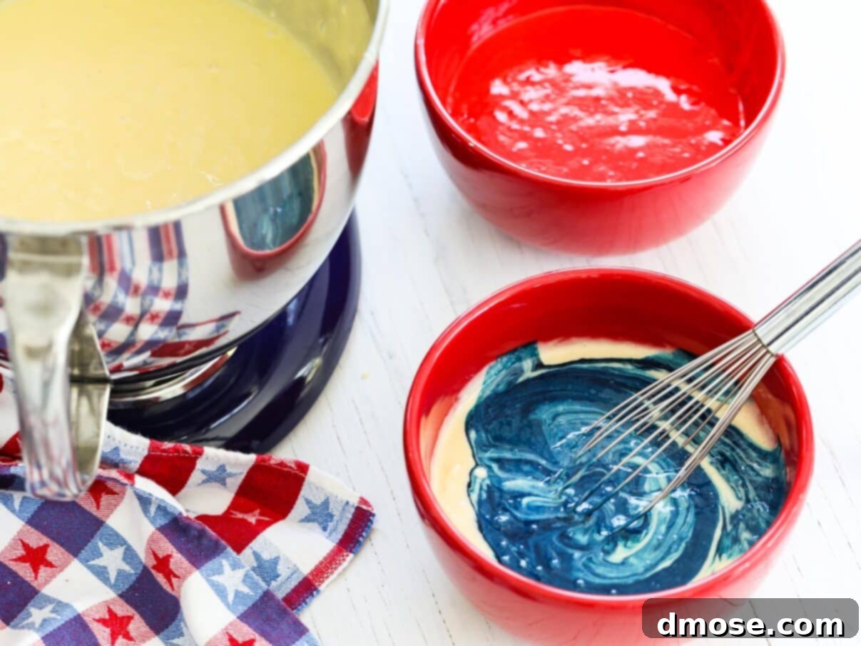 Coloring cake batter red, white, and blue for a patriotic American Flag cake.
