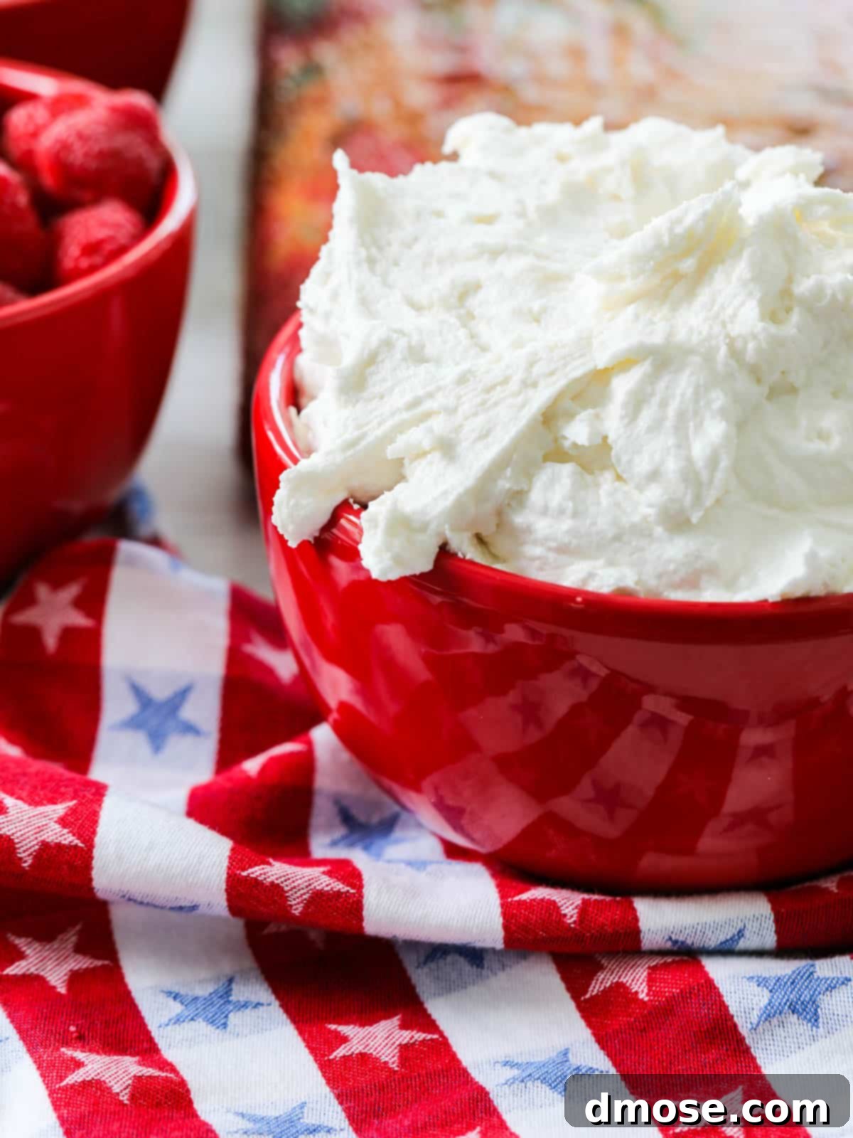 White fluffy buttercream frosting ready for decorating an American Flag Cake.