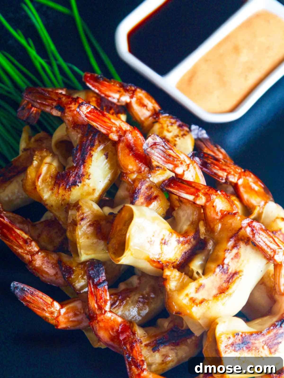 Hot Crispy Shrimp 2 Overhead shot of Firecracker Shrimp on a platter with dipping sauces.