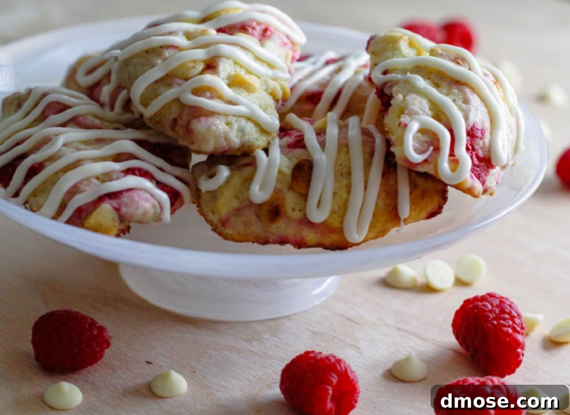 Unbaked raspberry chocolate scones with a rich texture, ready for the oven.