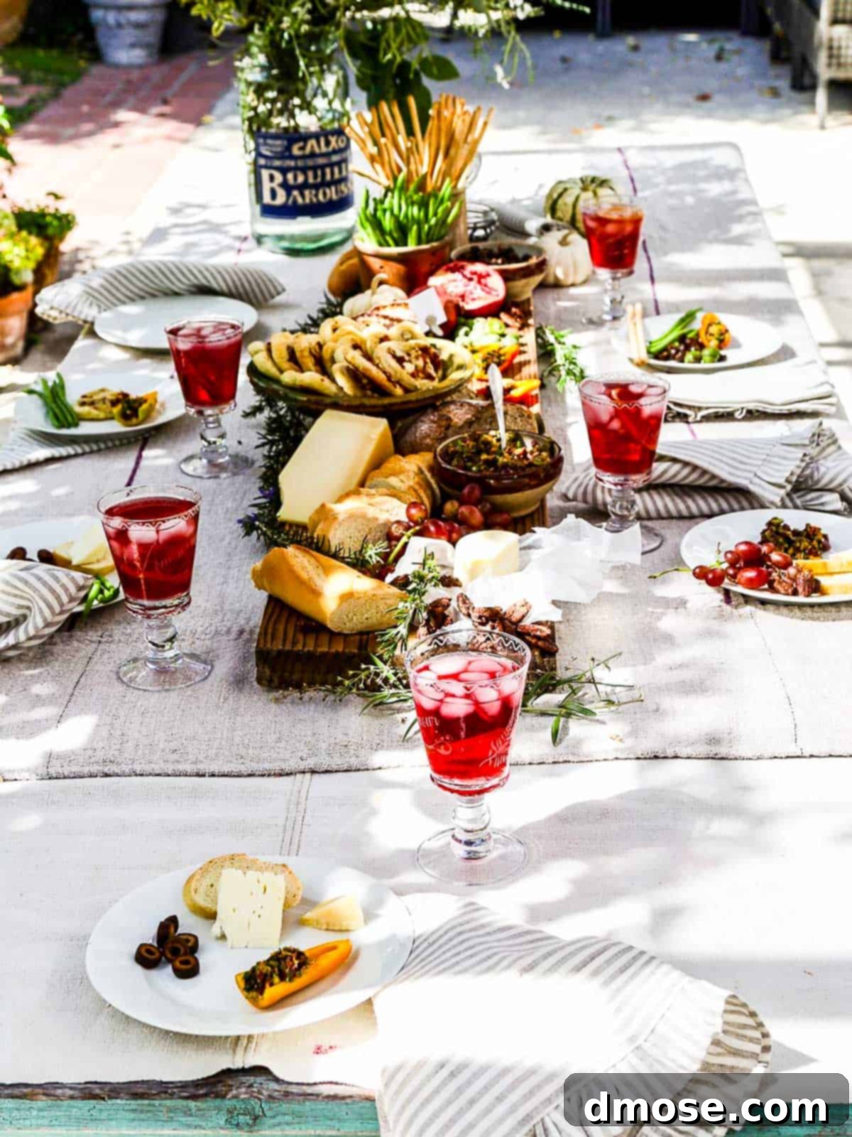 A beautifully set table with a display of Brie and Bacon Palmiers, ready for guests.