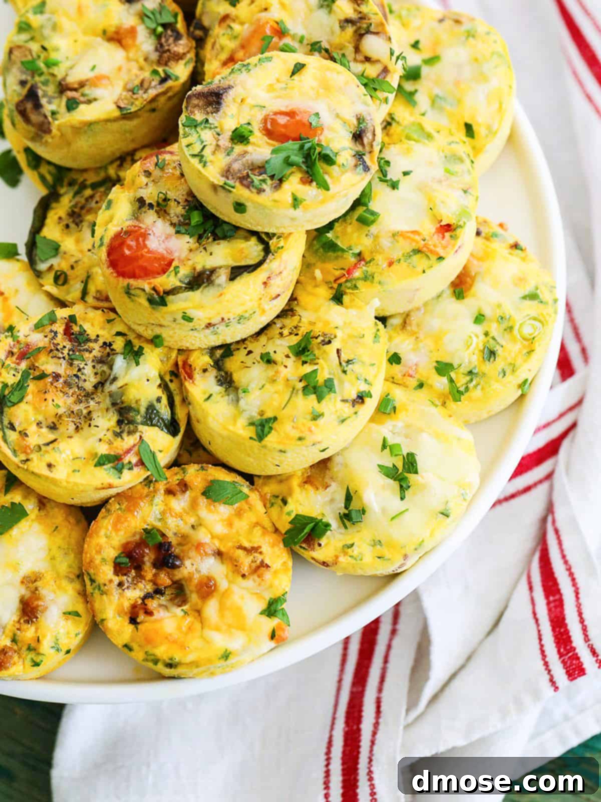 Egg muffins arranged beautifully on a cake plate, ready for serving.