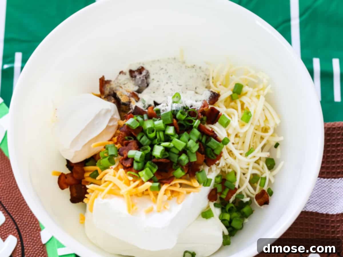 Gourmet Cheese Truffle Bites 7 All the ingredients for cheese truffles laid out: cream cheese, shredded cheddar, pepper jack, bacon, and seasonings.