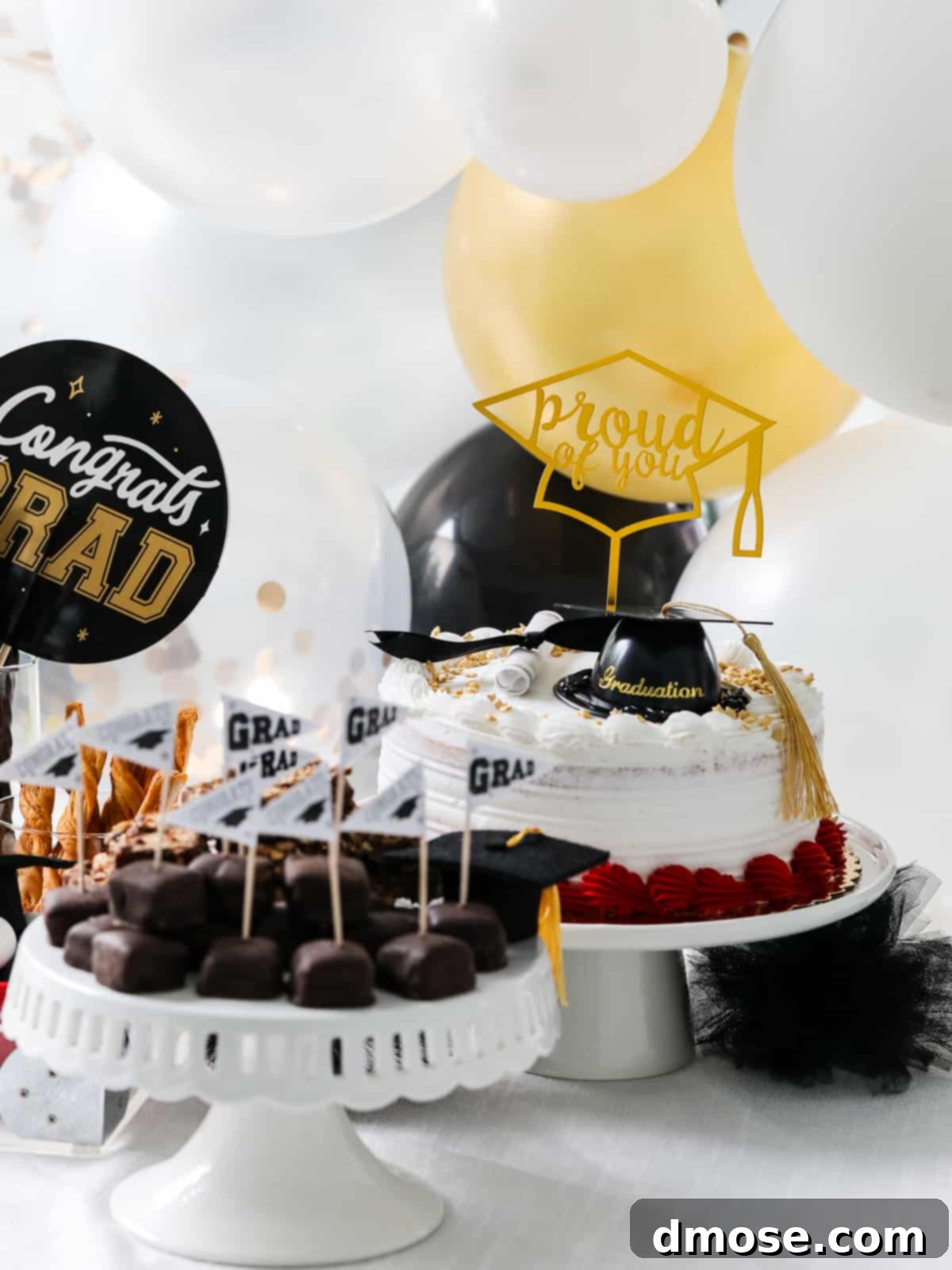 Graduation Party Food Inspiration for 2024 19 A beautifully arranged selection of graduation party desserts on cake plates.